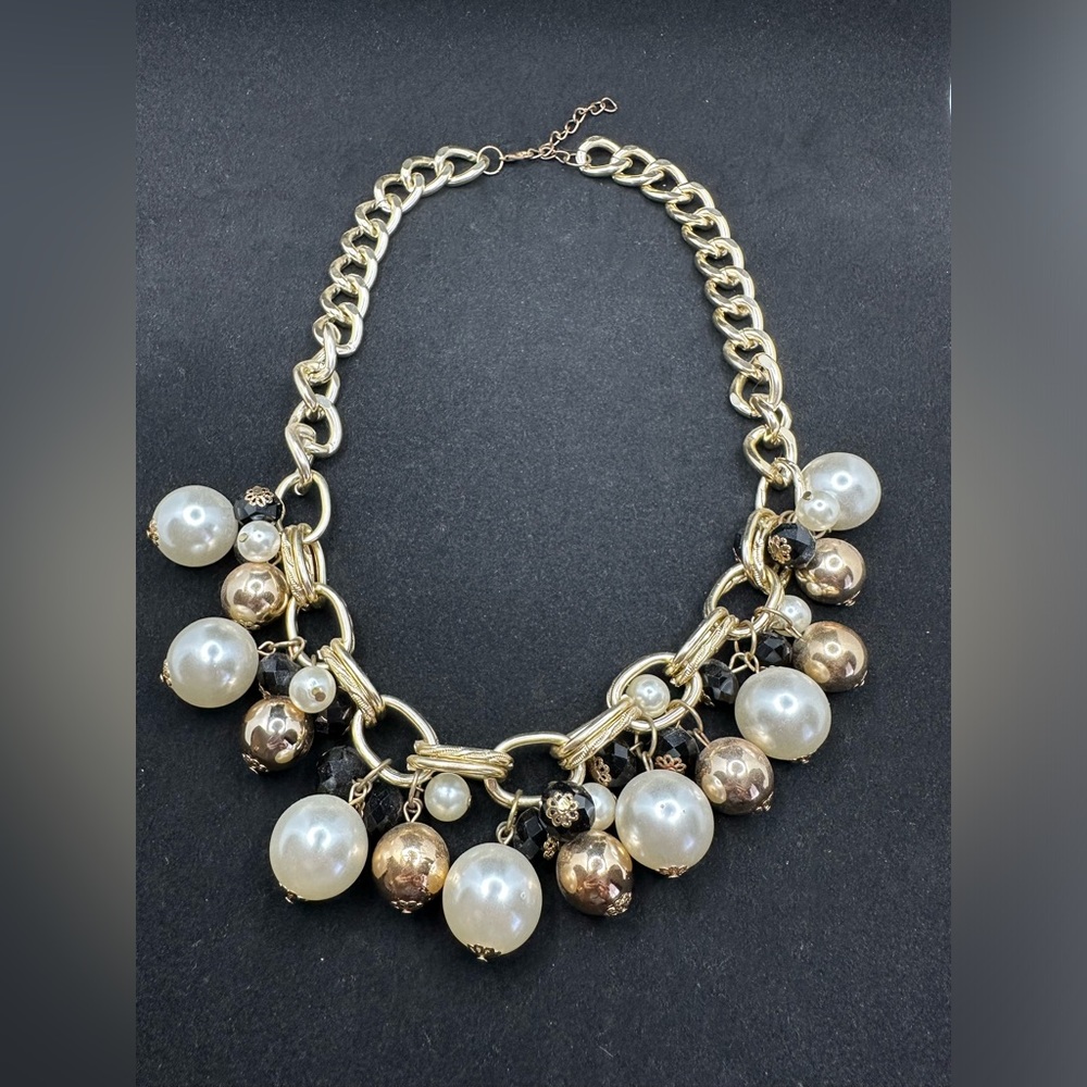 Statement Pearl and gold necklace with adjustable chain. 23 inch total length.